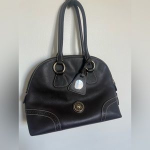 Dooney & Bourke pebble grain large domed leather purse